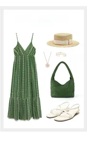 Flat lay of handmade green woven tote bag with summer dress and straw hat accessories