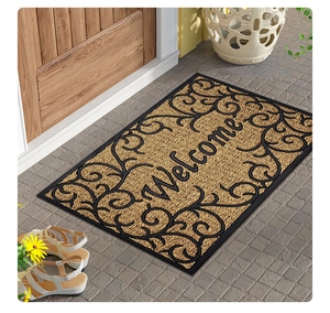 Gros plan du paillasson rectangulaire en fibre de coco avec bordure décorative en caoutchouc
