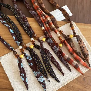 Bohemian fabric wood bead resin necklace set with paisley and floral patterns