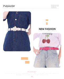 Detail view of stylish white and pink faux leather belts for women with square buckles