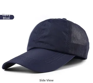 Detail view of navy quick-dry mesh baseball cap with breathable vents and side profile