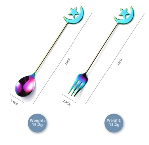 Detailed view of rainbow iridescent stainless steel dessert spoon and fork set with star motifs
