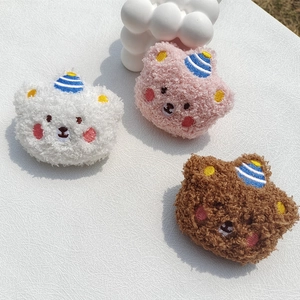 Detailed plush curly teddy bear brooches in white, pink, and brown with striped hats