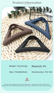 Macro detail of matte triangle hair claws in black, blue, and brown with 115mm size spec