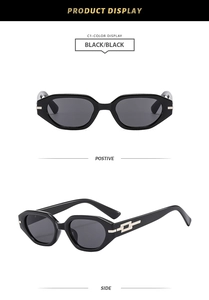 Macro detail of retro narrow square sunglasses with luxury gold chain accent on the temple
