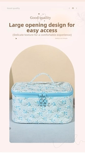 Floral makeup bag featuring double star zipper pulls and large opening design