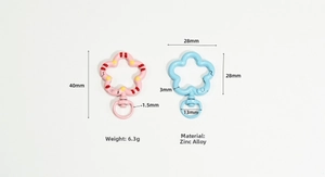 Macro view showing 40mm length and 28mm width dimensions of flower spring ring clasp