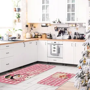 Christmas kitchen floor mat set featuring Santa Claus and snowman in festive decor