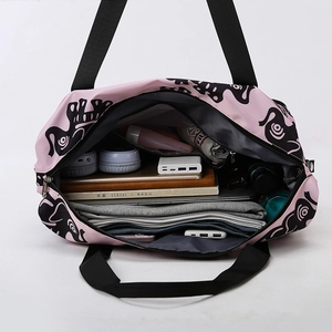 Pink cartoon elephant gym bag showing large capacity for laptop, books and travel gear