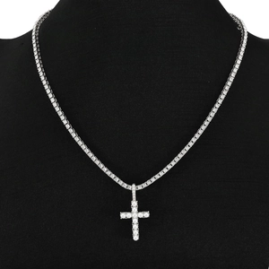 Icy silver tennis chain necklace with cross pendant featuring pearls and clear rhinestones