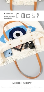 Macro shot of embroidered tote bag interior showing capacity for phone and cosmetics