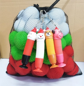 Detail of Christmas telescopic tube toys with suction cups and metal keychains