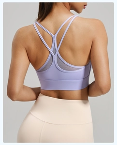 Close-up of the Y-shaped back design with purple breathable mesh on the sports bra