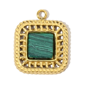 Detail of square gold pendant featuring green malachite stone with embossed grid texture
