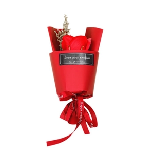 Red soap rose mini bouquet in matching red gift wrap for Valentine's Day and weddings