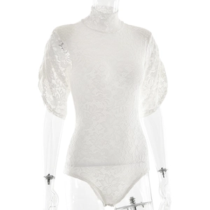 Detail of white lace short sleeve bodysuit with high collar and sheer mesh floral patterns