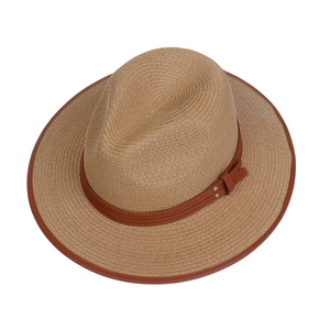 Detailed close-up of khaki straw fedora with brown leather belt and buckle trim