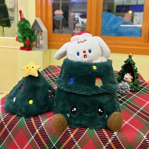 Detail of Christmas tree plush bag with white bunny toy on festive tablecloth