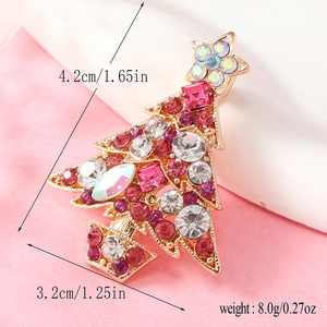 Detailed close-up of a Christmas tree brooch with colorful gems and size specifications