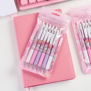 Pink My Melody stationery set with gel pens resting on a matching notebook and keyboard