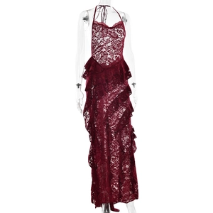 Detail of burgundy lace halter dress with elegant ruffle trim on a studio mannequin
