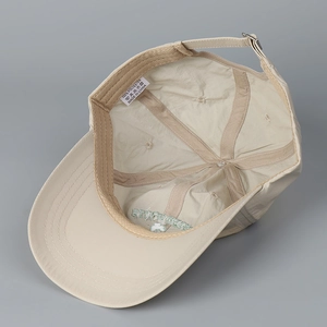 Quick-dry baseball cap with internal structure detail and adjustable metal strap buckle
