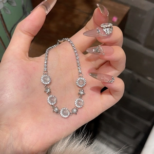 Elegant zircon flower bracelet with translucent round stones in a silver-tone setting