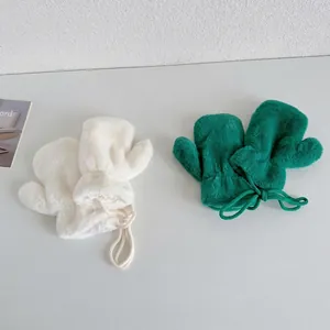 Thick plush winter mittens for kids in cream and green with anti-lost hanging cords