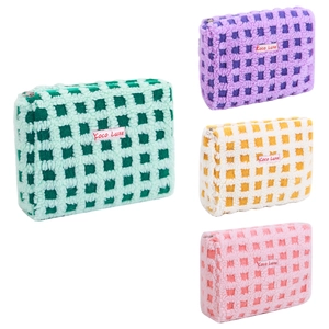 Waffle plush checkered cosmetic bag in green, purple, yellow, and pink colors