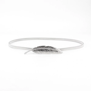Silver elastic metal waist chain for women with a detailed leaf shaped buckle for dresses