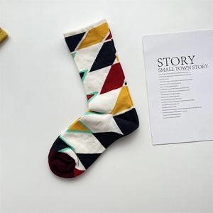 Detail of French oil painting cotton socks with geometric diamond patterns and chic texture