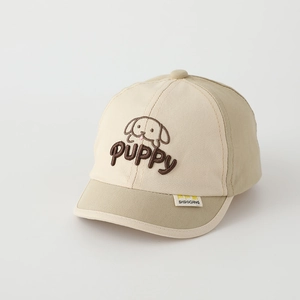 Close-up of cute puppy embroidery and soft fabric texture on this toddler baseball cap