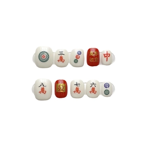 Handmade mahjong press-on nails set with red and white festive traditional Chinese patterns