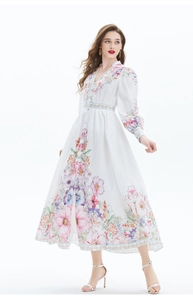 Full view of floral print V-neck maxi dress with lantern sleeves and a cinched waistline