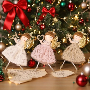 Three ballet angel doll ornaments in cream, pink, and brown for Christmas tree decor