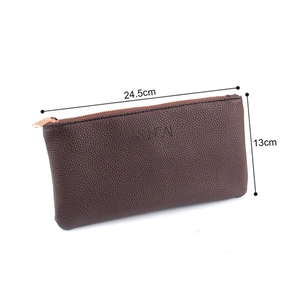 Detail view of large dark brown PU leather makeup pouch with rose gold zipper 24.5x13cm
