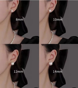 Size comparison chart showing 8mm to 14mm white pearl earrings on ear for scale