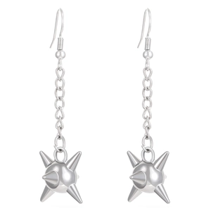 Detailed view of silver punk chain earrings with spiked mace pendant in macro photography