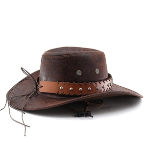 Detail of dark brown cowboy hat featuring metal studs on a braided leather decorative band