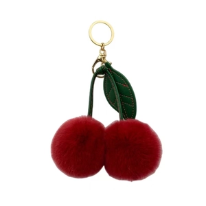 Cute cherry plush keychain with red faux fur pom poms and golden metal clasp for bags