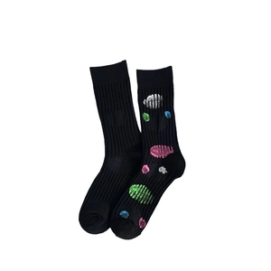 Ribbed black cotton crew socks featuring colorful 3D textured oval patterns for women