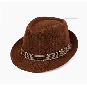 Detail of coffee linen jazz hat featuring a striped band and breathable woven texture