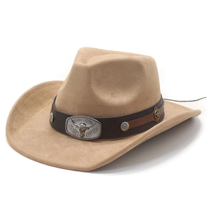 Macro detail of western faux suede hat featuring a silver bull head emblem and vintage studs