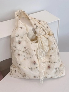 Floral embroidery beige tote bag with lace-up details in breathable tulle fabric
