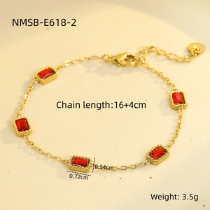 Detail of gold chain bracelet with five red rectangular zircons and 16+4cm length