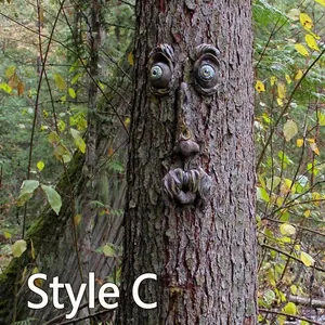 Luminous tree face garden decoration Style C with glowing eyes on a rustic tree trunk