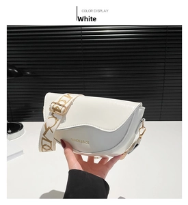 Detail of white saddle bag with FASHION & BAGS logo and coffee geometric wide strap