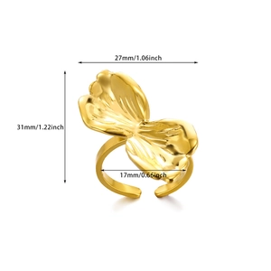 Gold plated stainless steel bow ring with oversized abstract design and dimensions