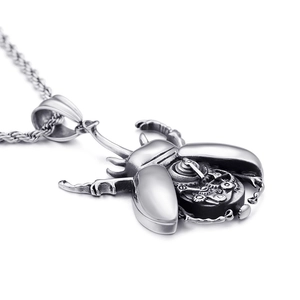 Punk style stainless steel beetle pendant with internal mechanical gears and silver finish