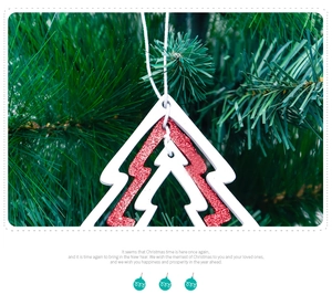 Close-up of three-layer pine tree ornament with red glitter on a green branch